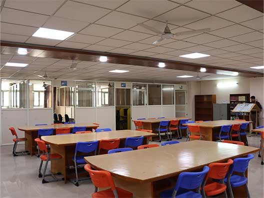 spacious-college-library-reading-room-with-study-tables-and-chairs